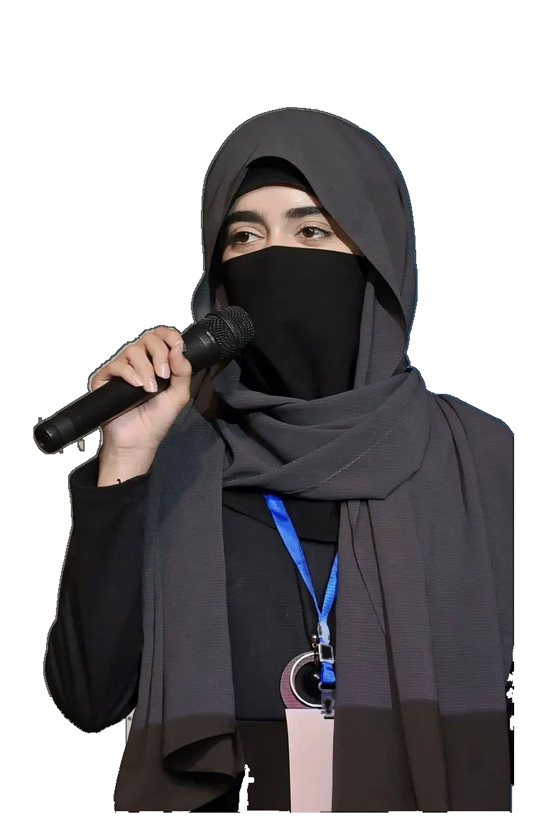 Aisha Riaz speaking at a professional event